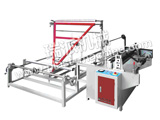 FOLDING AND WINDING MACHINE